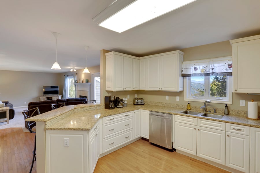 Eat in kitchen with stainless steel appliances