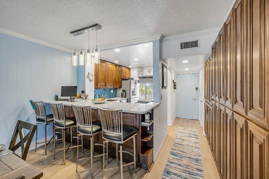 Well appointed kitchen with breakfast bar and ample storage
