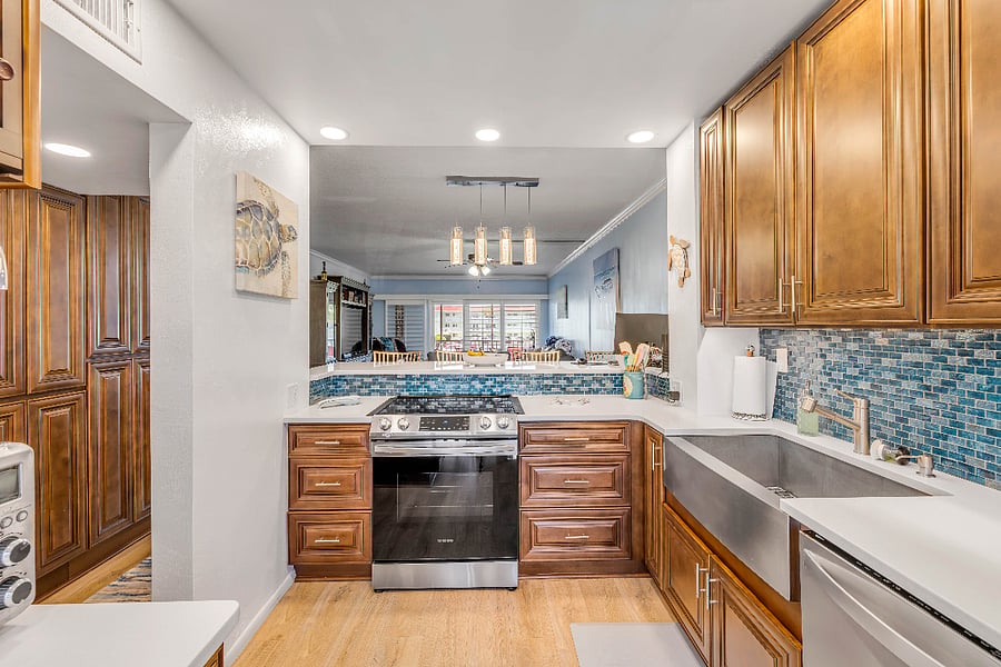 Beautiful cabinetry in a well stocked kitchen
