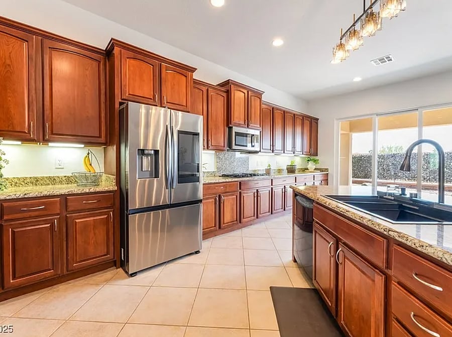 Updated kitchen with fridge, microwave, oven and stove.     