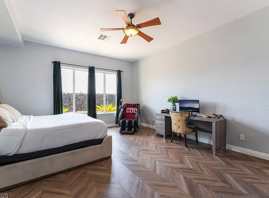 Master Bedroom with work desk and massage chair. 