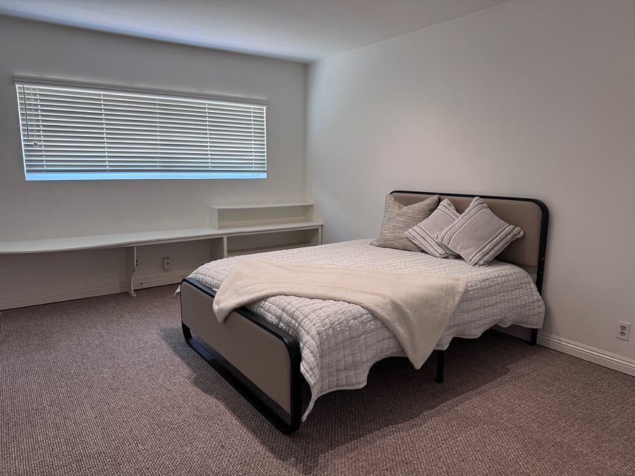 Second bedroom with queen, bed, and built in desks. Lots of closet space. Brand new mattress. 