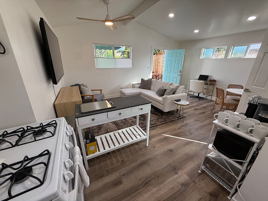 The open plan, abundant windows and natural light and vaulted ceilings makes it open and airy. 