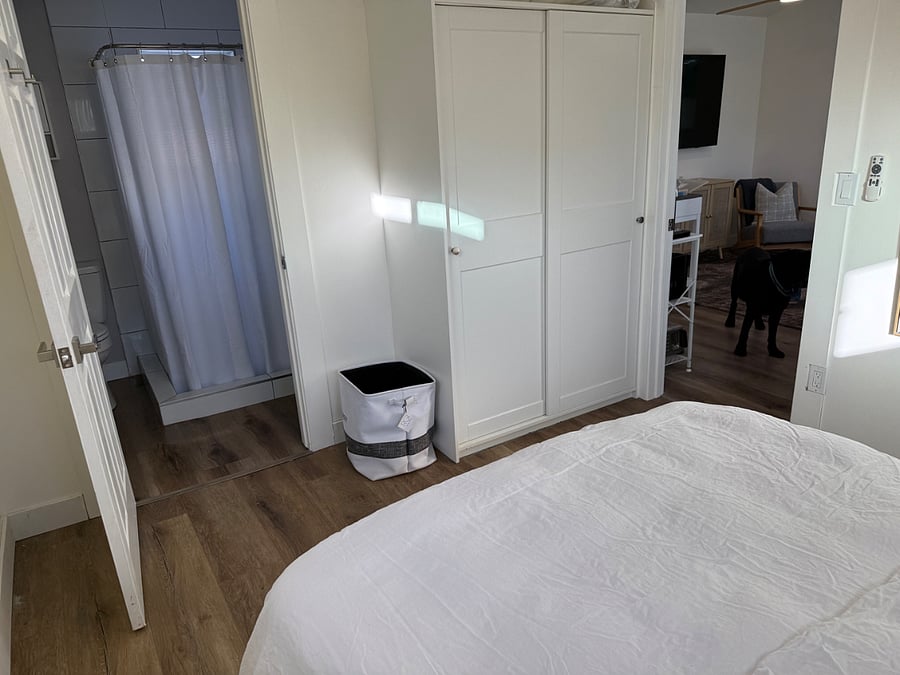 The large wardrobe is complemented by baskets for bulky items, a dedicated shoe tower, and if you need even more room for luggage and what have you theres a storage shed in the backyard. 