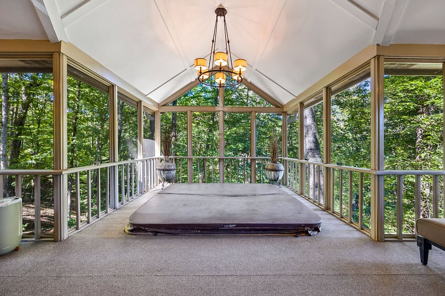 hot tub in screened-in patio