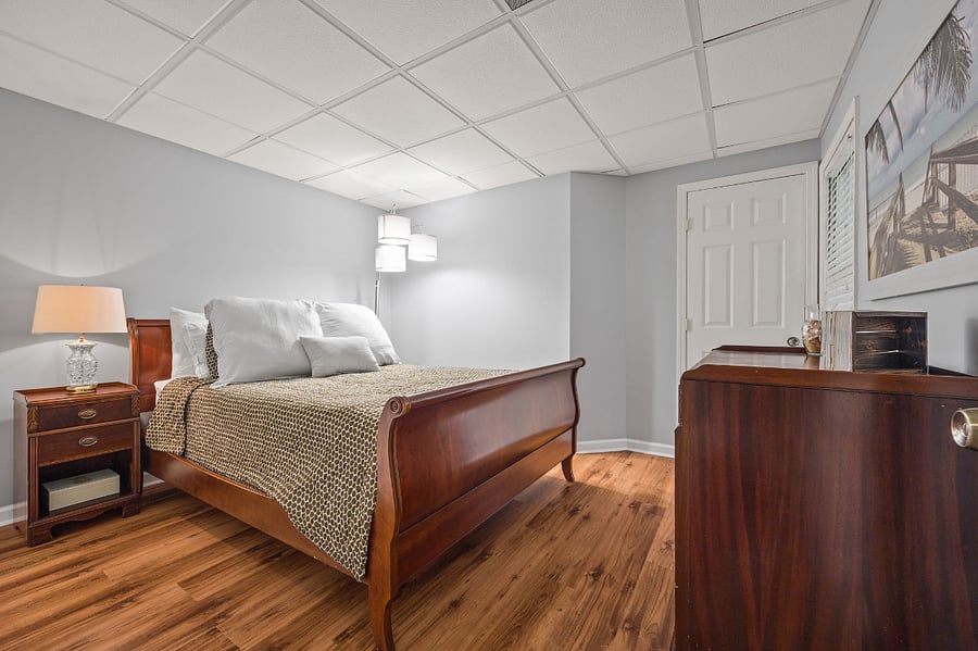 5th bedroom with full bathroom located in the basement