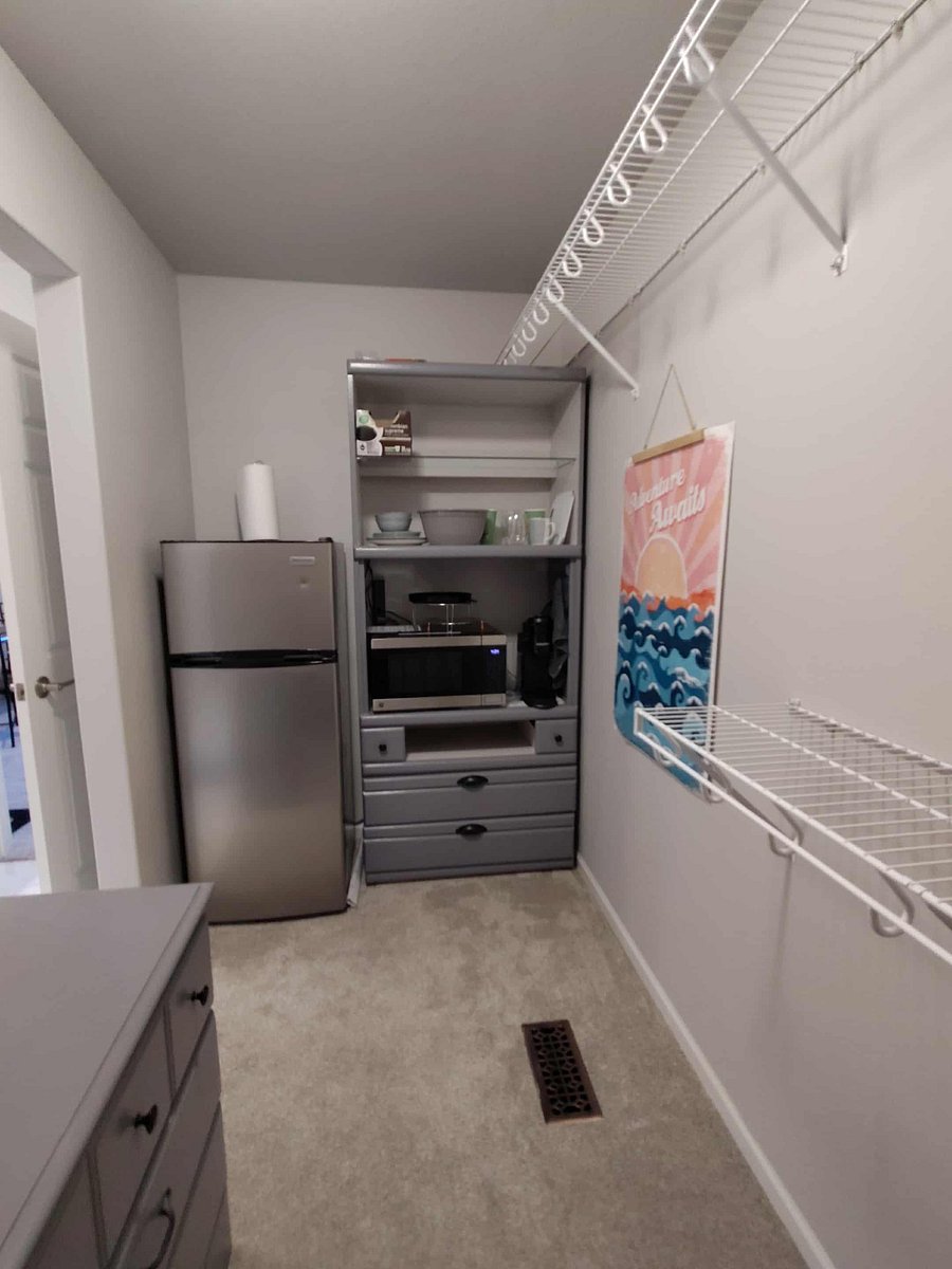 Kitchenette includes apartment size fridge/freezer, Keurig coffee maker, and 4-in1 Oven (Microwave, Air Fryer, Broiler, Convection) as well as cups, dishes, and utensils.