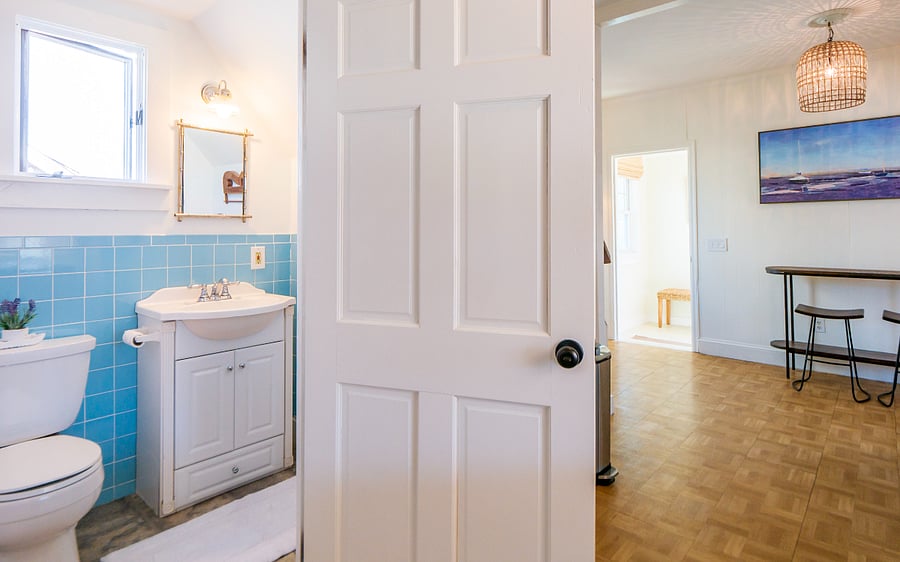 Bathroom is off of the kitchen