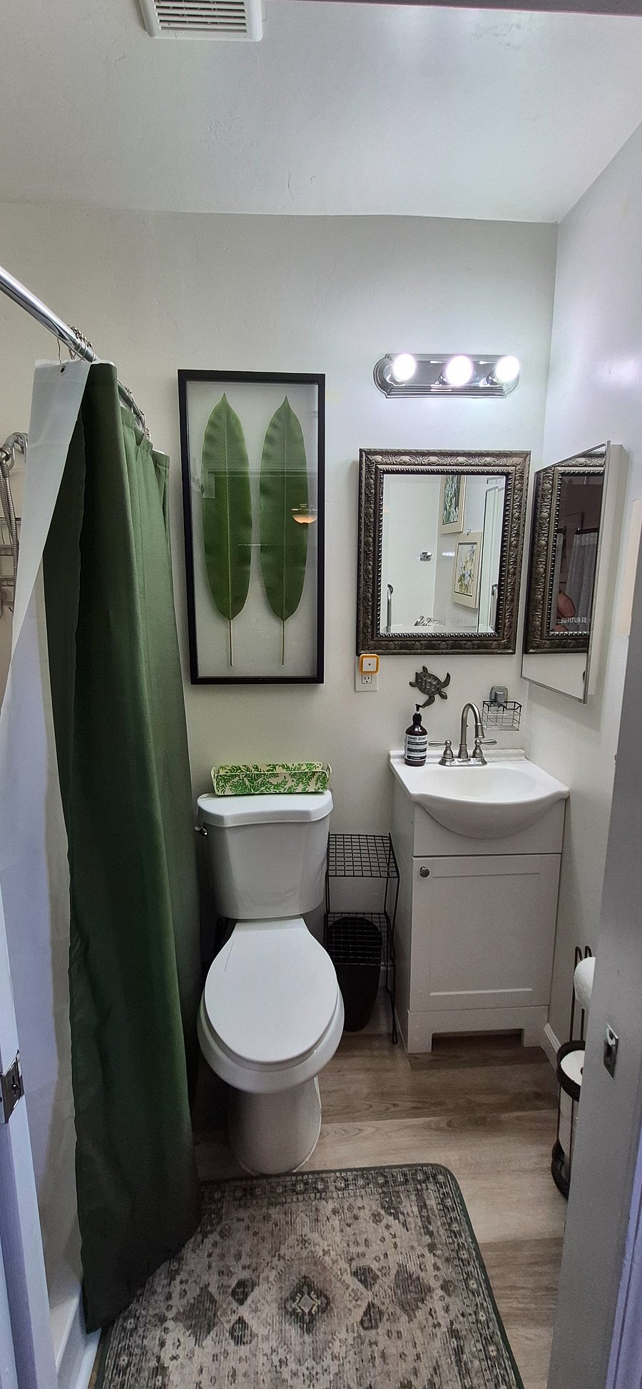 3/4 bath - shower, toilet, & sink, & some storage