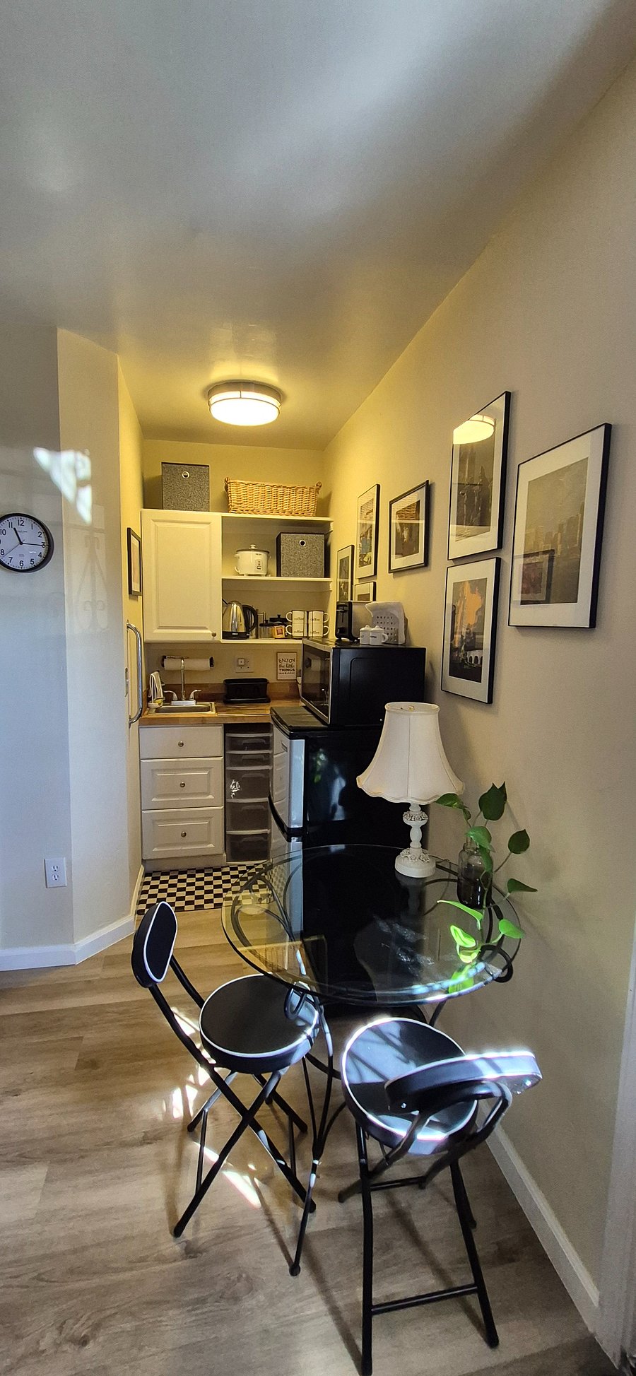 Kitchenette with mini-fridge, microwave, air fryer, toaster, electric kettle, rice cooker, french press, dishes, silverware, storage containers, etc.