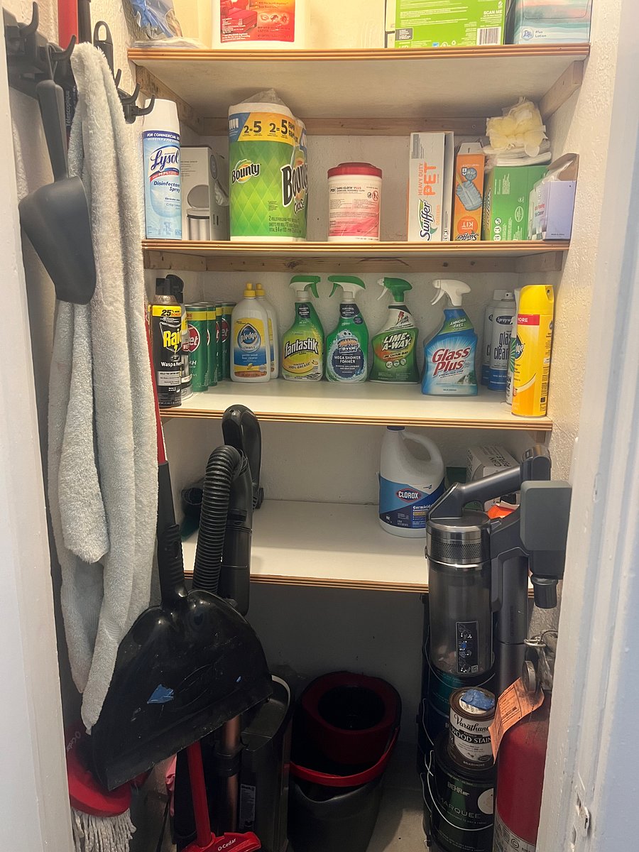 Hall closer with cleaning supplies