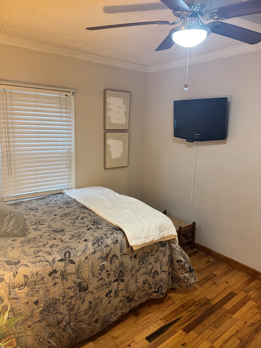 2nd Bedroom - Full size bed, smart TV, dresser and closet