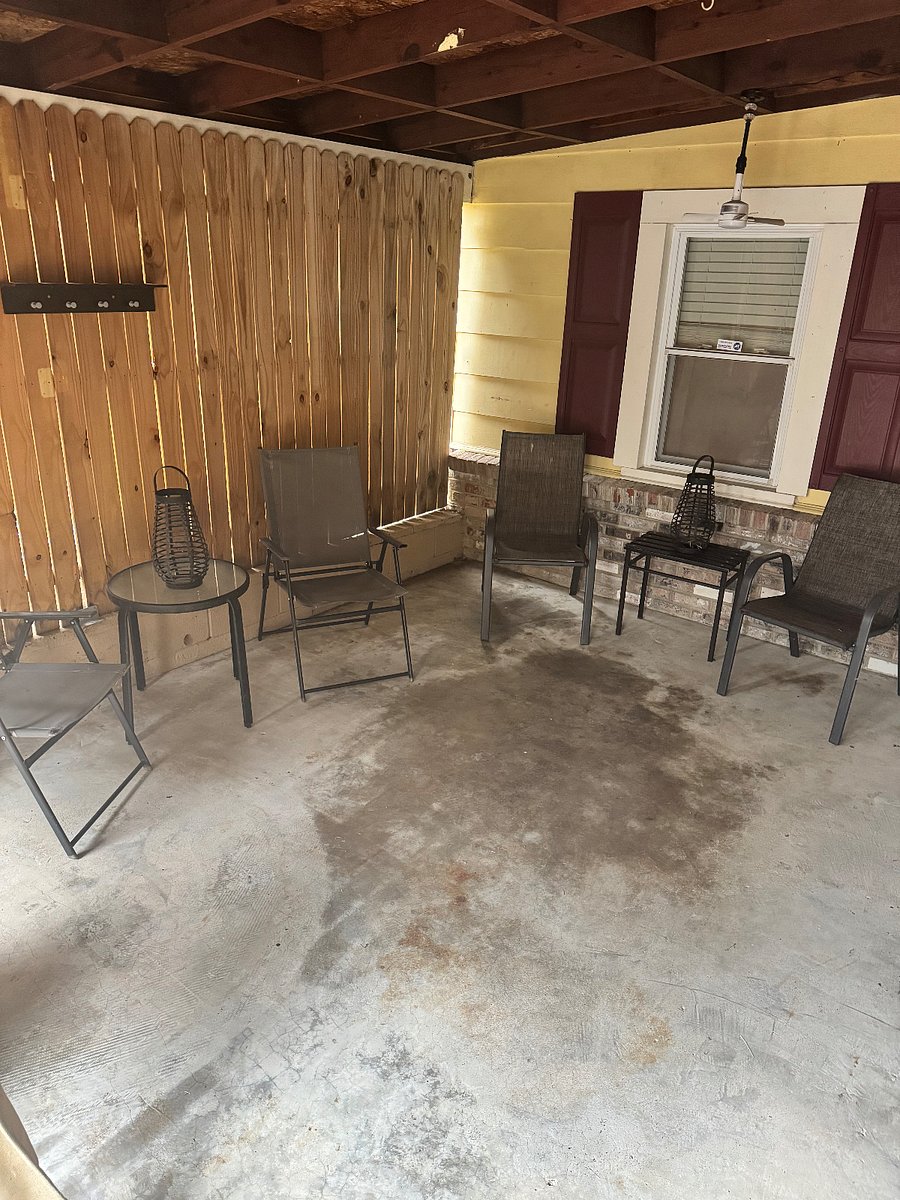 Enclosed Carport with outdoor living amenities