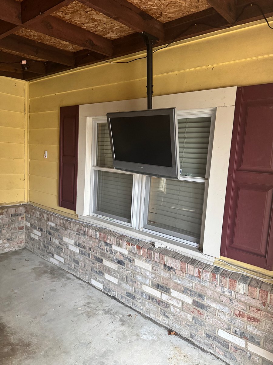 Enclosed Carport with outdoor living amenitie