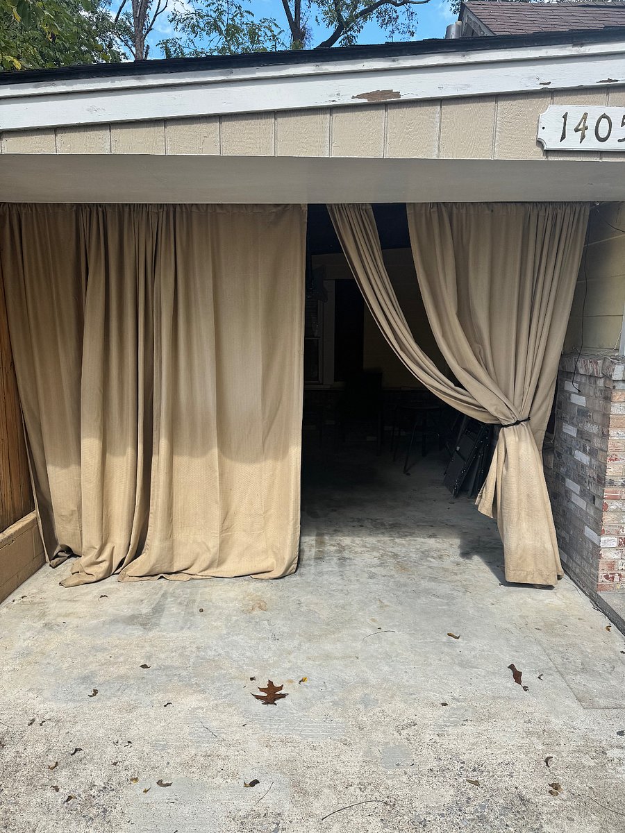 Enclosed Carport with outdoor living amenities