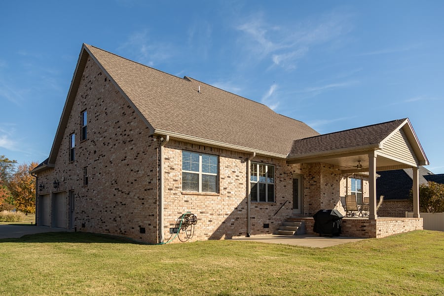 Beautiful and private backyard with large, covered patio and grilling area. Webber Spirit grill on lower patio.