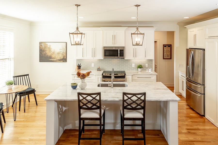 Huge kitchen with very large center island that perfect for conversations with guests in the living room. Also, watch the game while cooking.