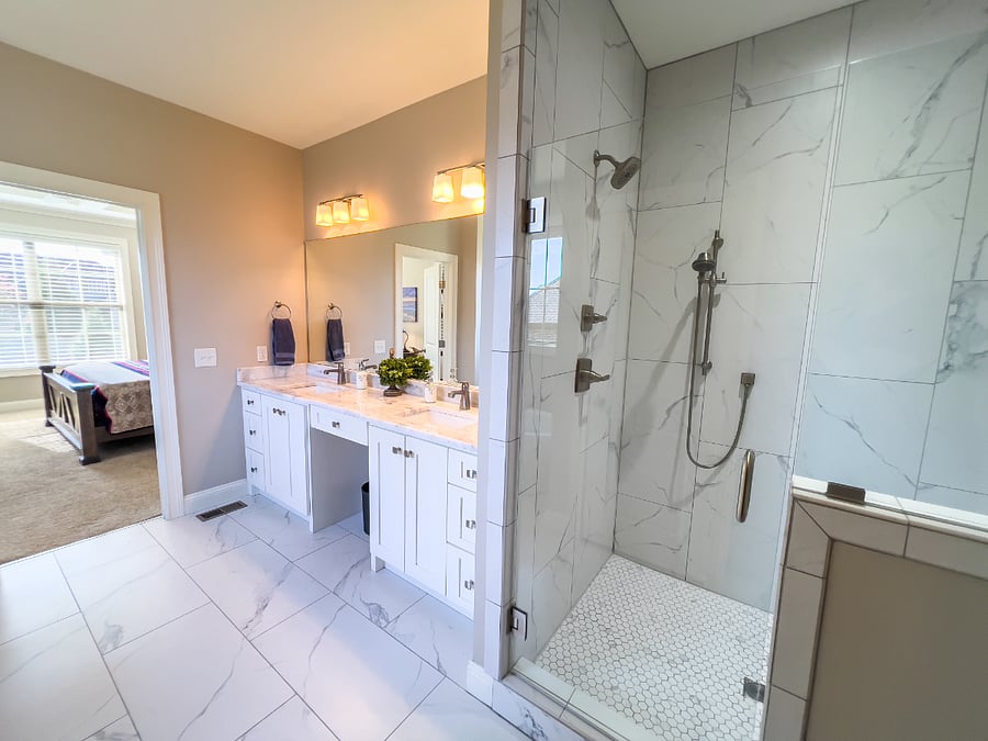 Large Master Bathroom with double sink, deep soaking tub, large shower, walk-in His and Hers closet.