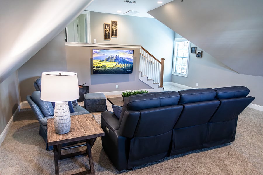 Huge bonus room with seating area to watch the 65" OLED Smart TV Spectrum basic cable TV and fastest internet speed. Leather electric reclining sofa - zero gravity and head and lumber and foot.