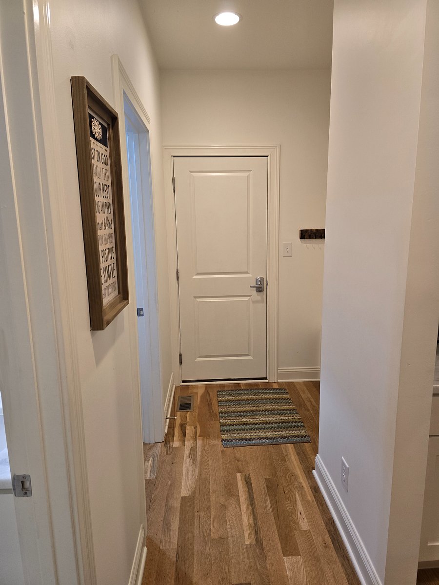Garage Entrance with coat area the laundry room is right next to this entrance and the small downstairs bedroom and main level bathroom