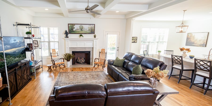 The Living room is so cozy, and the fireplace has a beautiful gas fire with no encasing. It feels like a wood fire. Large flame as well.