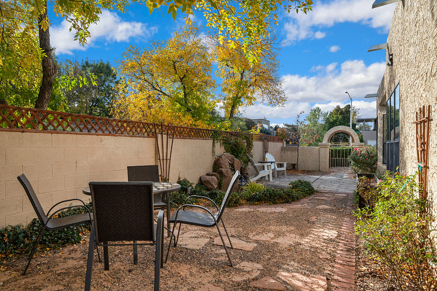 outdoor dining in your backyard fully fenced in oasis