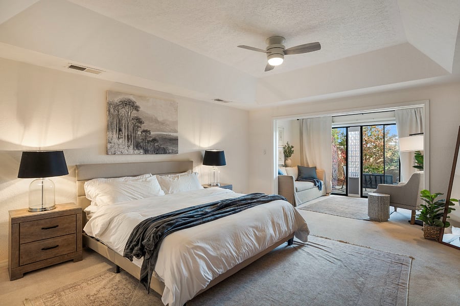 master bedroom retreat located on first floor- with large sitting room, ample space and storage, high ceilings- balcony off master- and attached master full bathroom and closet