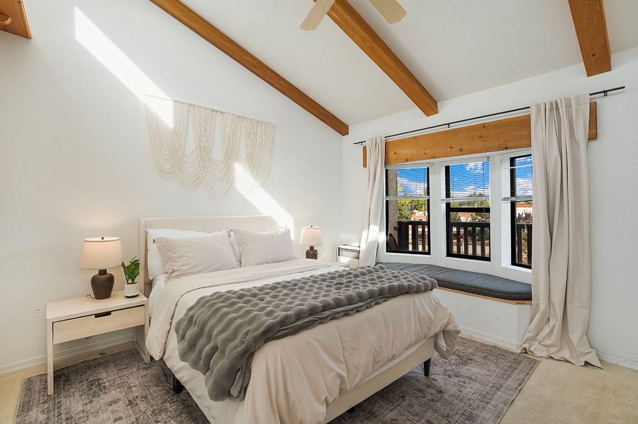 third bedroom upstairs- private balcony access- queen bed and ample storage