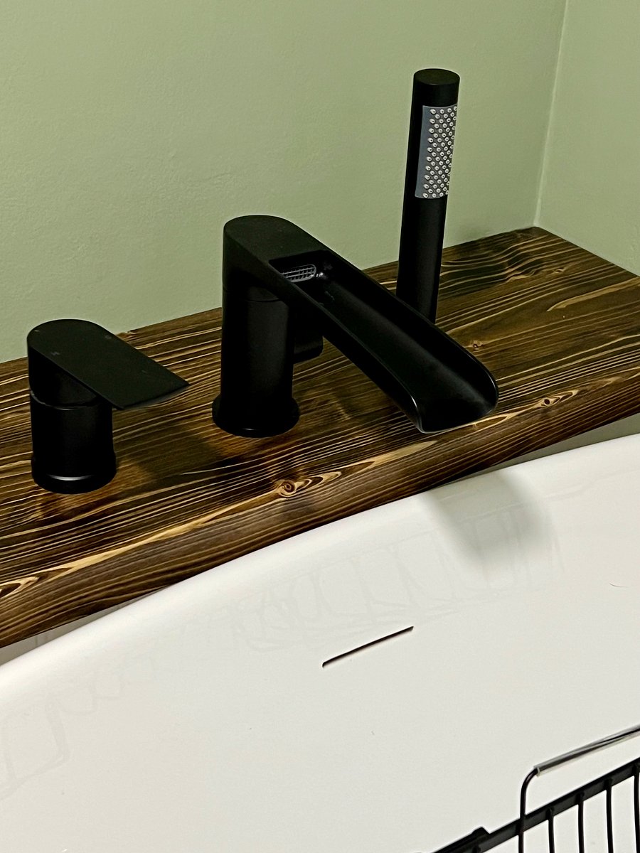 Built-in handheld shower head on soaking tub (great water pressure)