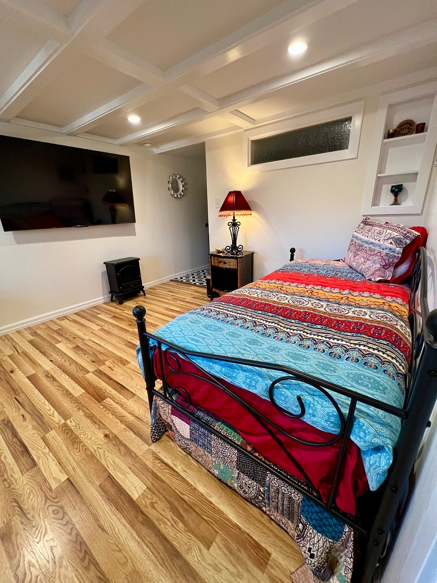 Twin trundle bed with comfortable mattresses. Set of new sheets provided for main mattress.