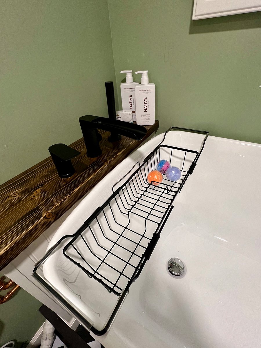 Soaking tub with hand-held shower head having good water pressure