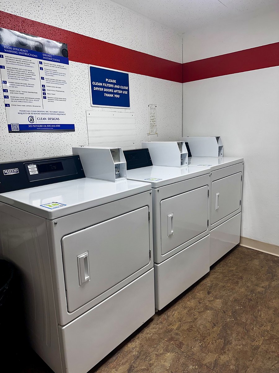 Laundry room with 3 washer and 3 dryers