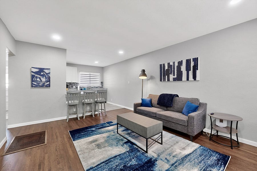 Comfortable living room and bar area into kitchen