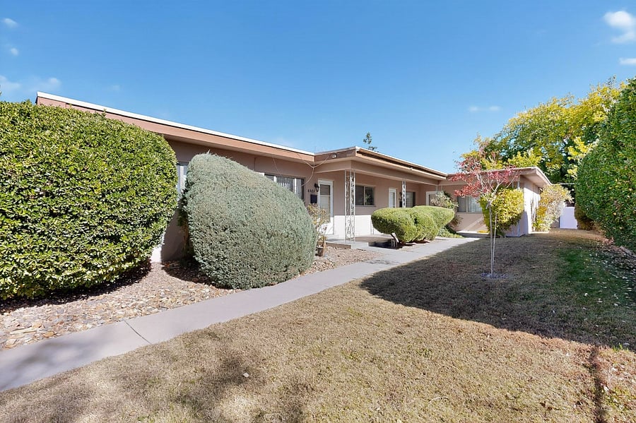 Building is a triplex on a quiet, tree-lined street