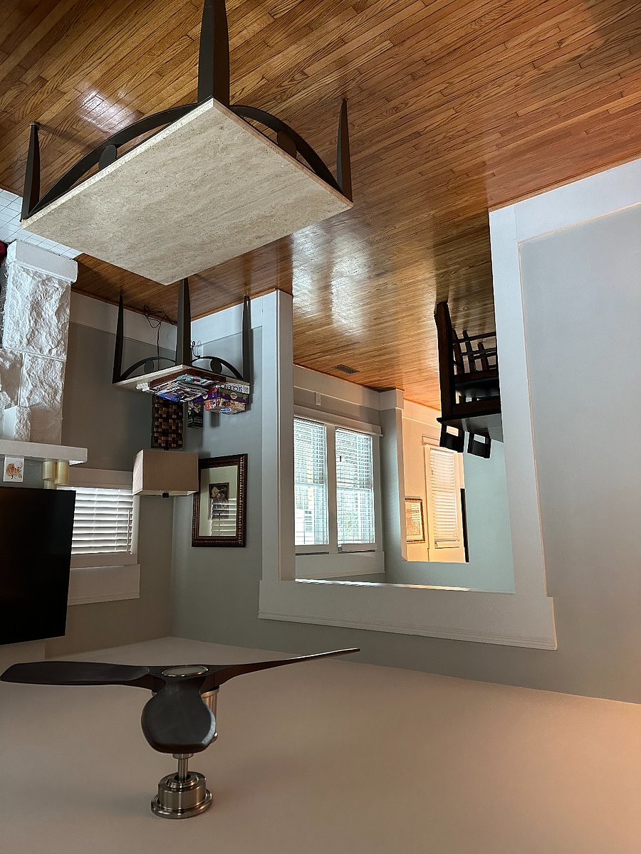 A view from the dining room, looking into the living room