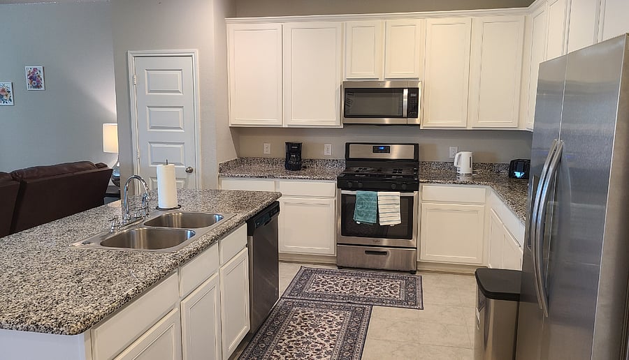 Kitchen fully stocked with cookware