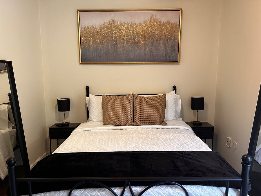 Bedroom 1 has a Full sized bed, closet and a 32 inch Smart TV