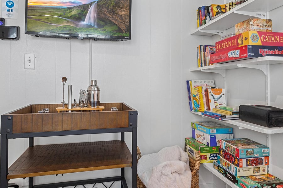 Family favorites, quiet reads, and game night essentialsall in one cozy corner with a smart TV and bar cart. A kid-friendly South Bend stay near Notre Dame, built for connection and fun.