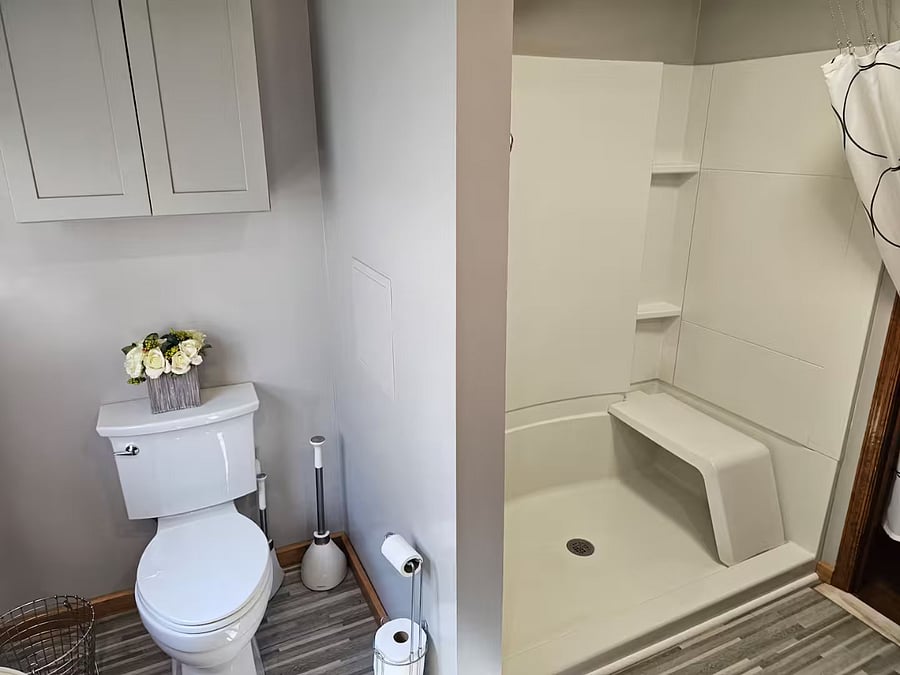 Large walk-in shower with seat