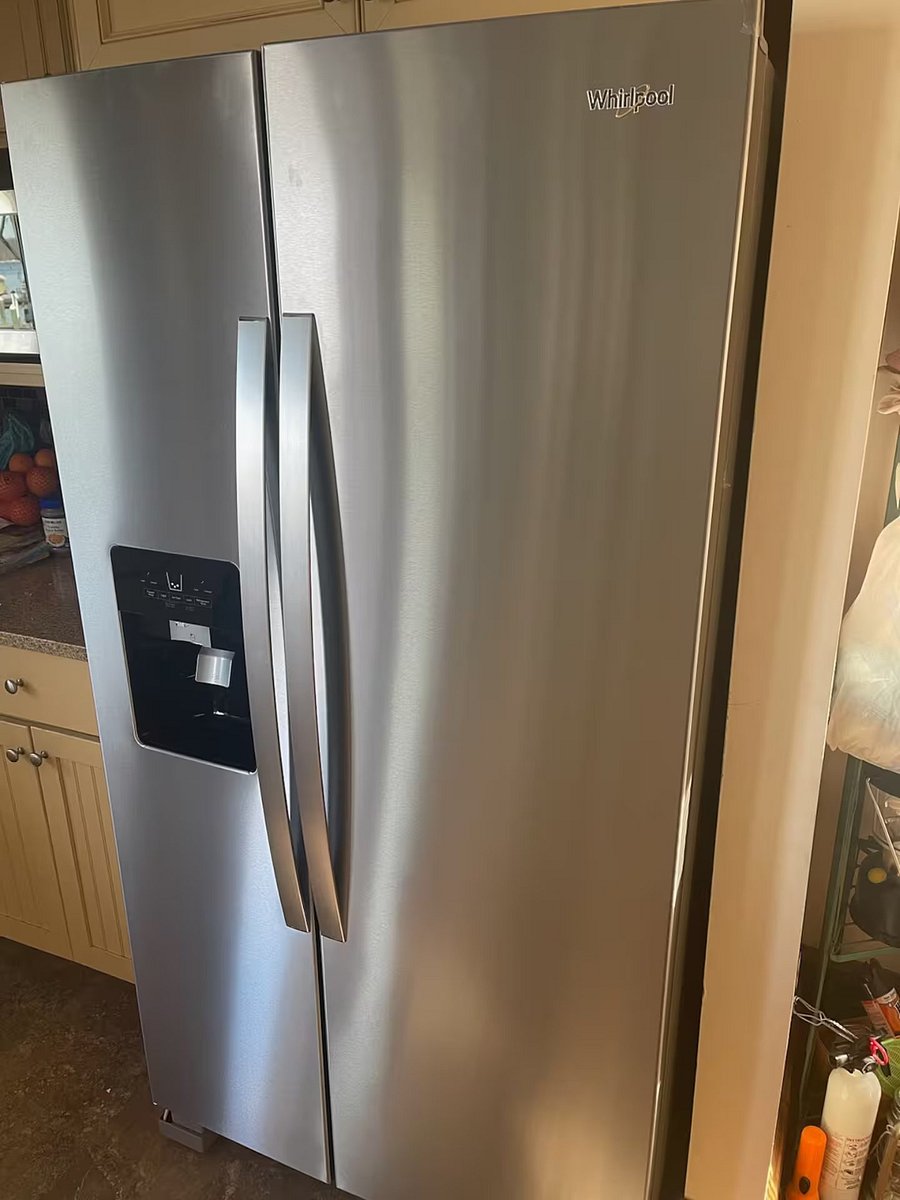 Stainless Steel with additional frig. in foyer