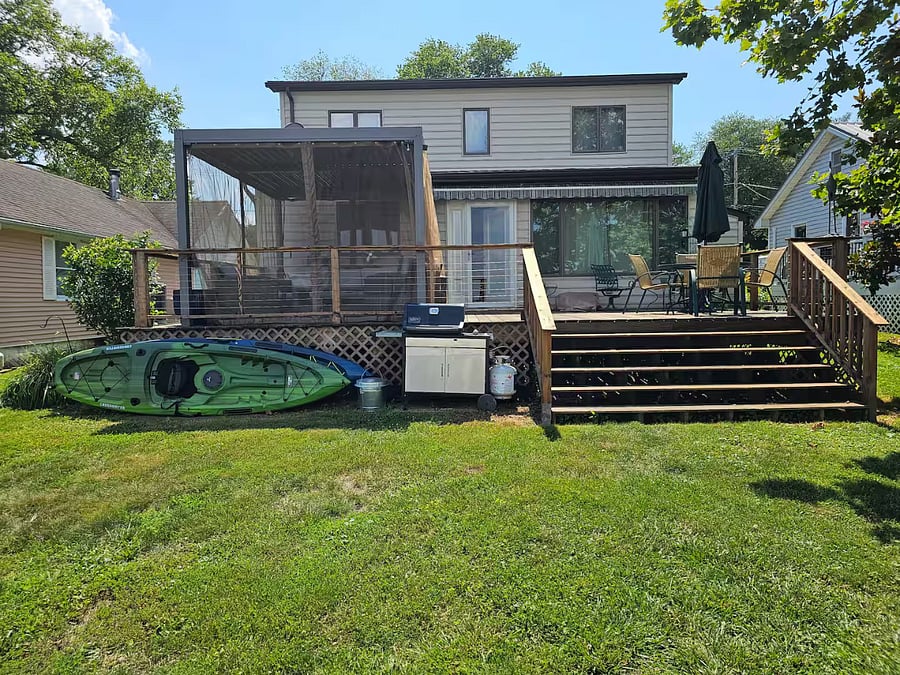 Gas grill off of deck