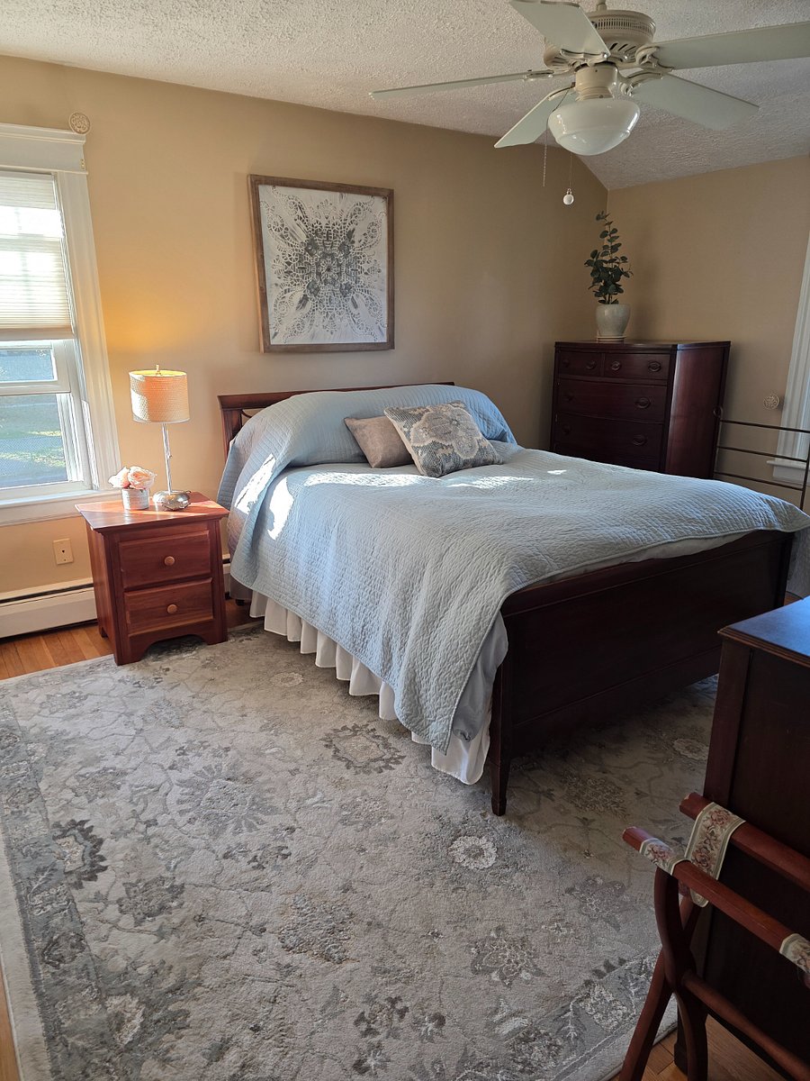 Upstairs bedroom with window detail