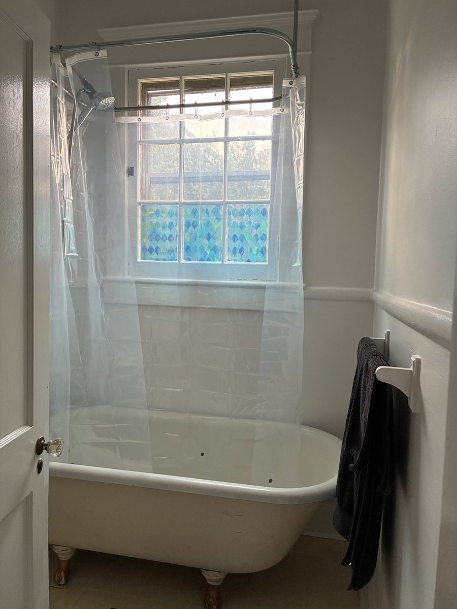 Enjoy a soak in this romantic clawfoot tub or shower using the magnetic hand-held wand for those rushed days.