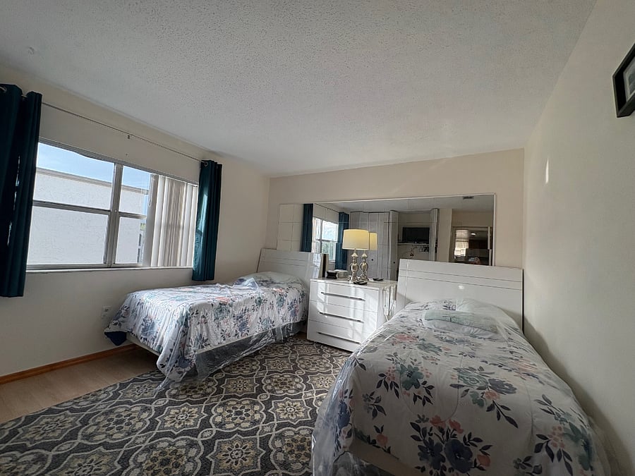 two full beds in the second bedroom