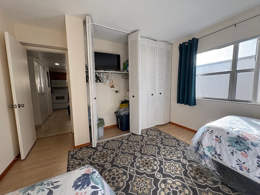 closet and TV for bed 2