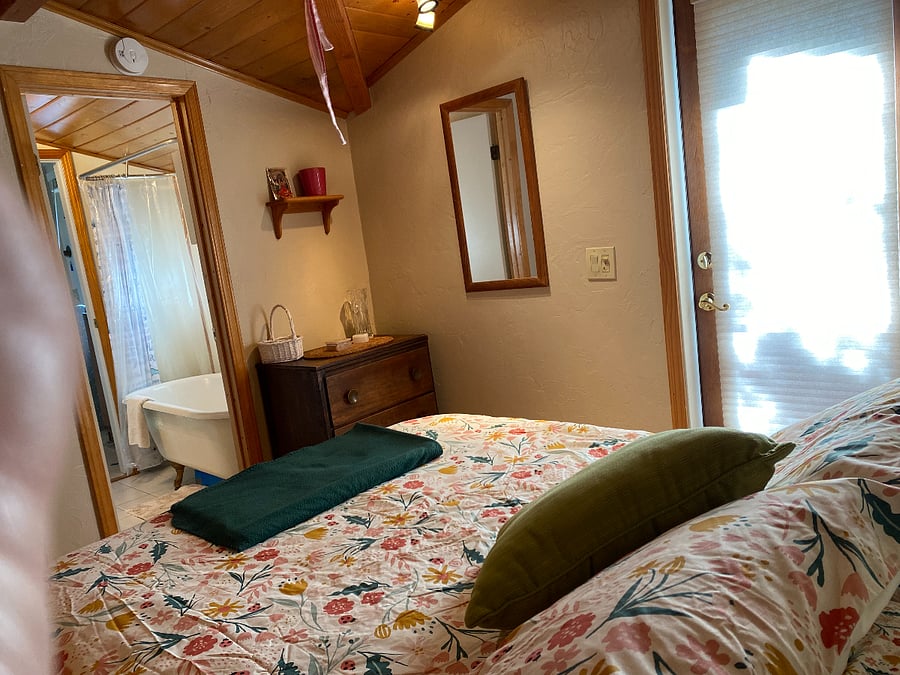REDWOOD DECK ACCESSIBLE FROM THIS MASTER BEDROOM