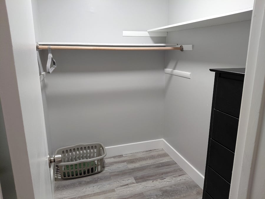 Laundry basket and a few hangers included, as seen in photo. 