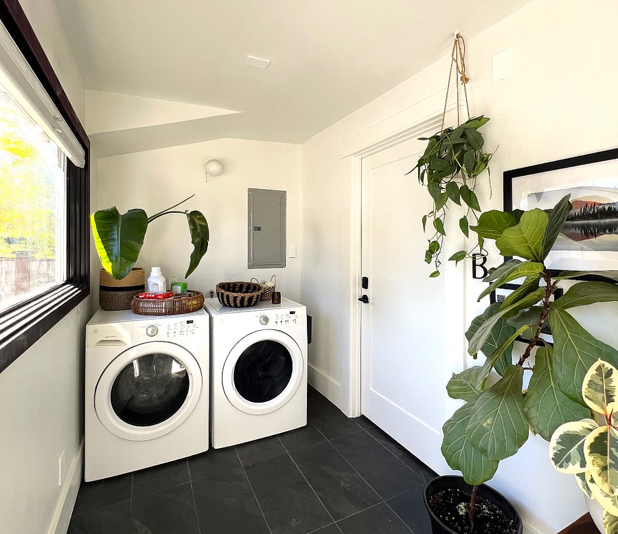 The shared back entrance opens onto the shared laundry room. The door pictured here is the door up to Unit B.