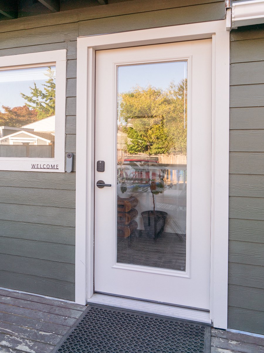 Shared back entrance showing keyless entry. We have exterior cameras for security.