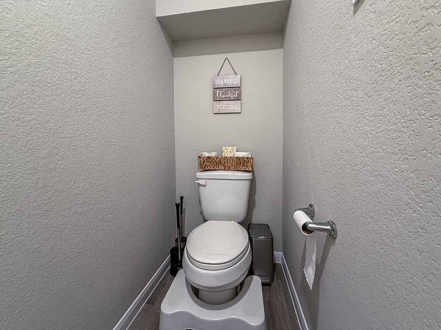 Separate toilet room for added privacy and convenience, keeping the master bathroom comfortable and functional.